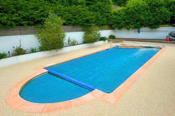 Luxury resin pool surround with terracotta edging